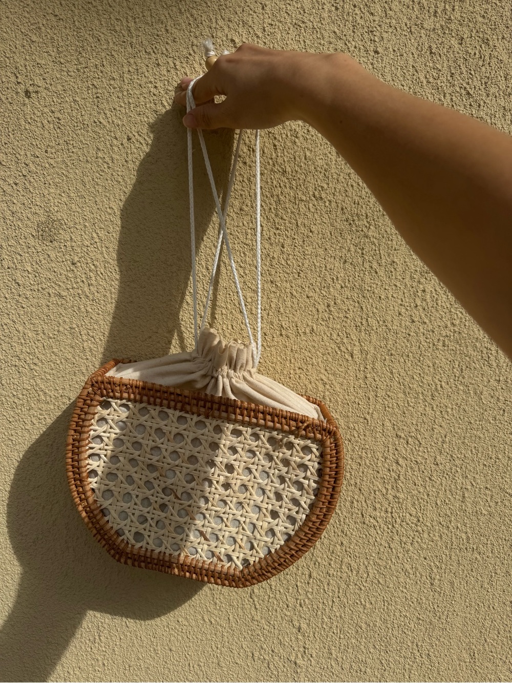 Woven Rattan Drawstring Clutch - Picture 2 of 6